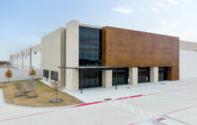 North American Arm of Major Electric Vehicle Parts Supplier Plants Flag in Texas