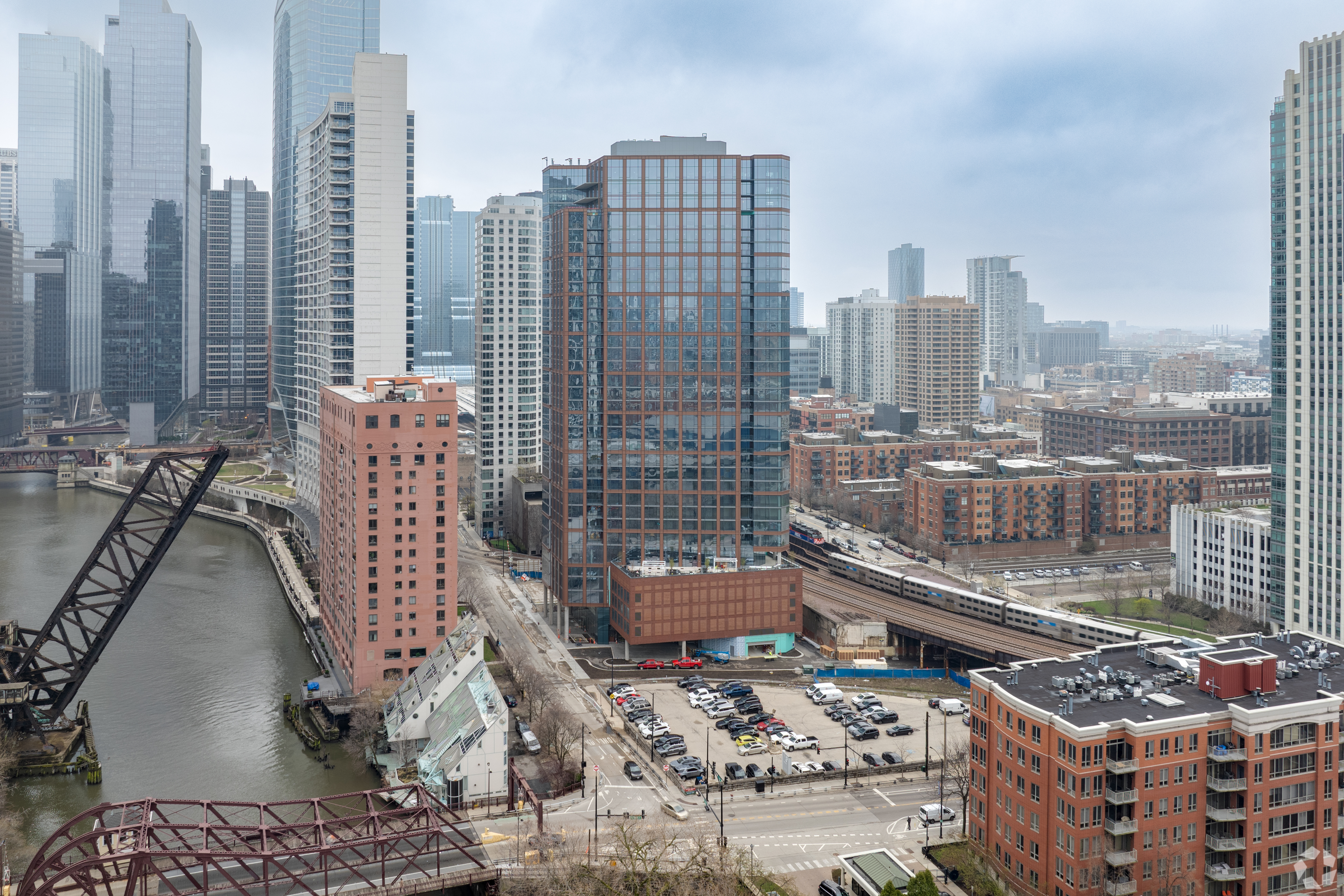 Chicago Apartment Tower That Replaced 120-Year-Old Cassidy Tire Building Welcomes First Residents