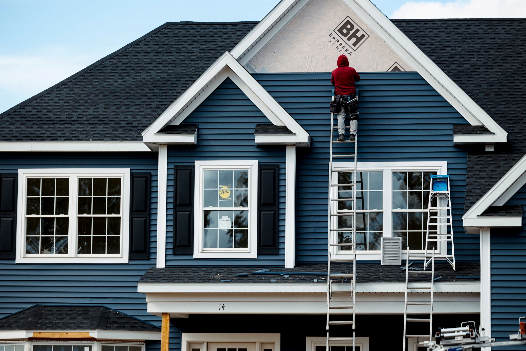 New home sales edge higher; Google parent plans to boost AI spending; Tesla sales drop